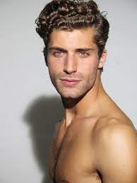 Half updos are a favorite for a reason: Thom Morell Curly Hair Men Casual Curls Curly Hair Styles