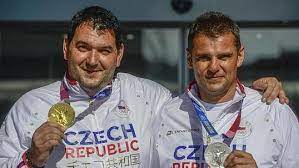 Czech shooters silver david kostelecký (left) and gold jiří lipták (right) pose with coach petr hrdlička, who won a gold medal in the same discipline at the 1992 olympics in barcelona. 2dfputwgnpp Cm