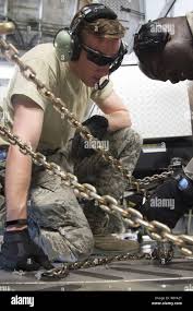Air Force Staff Sgt. Quincy Garner of Acton, Mass., plays "Taps" in memory  of Sen. Edward Kennedy prior to a baseball game between the Boston Red Sox  and the Chicago White Sox