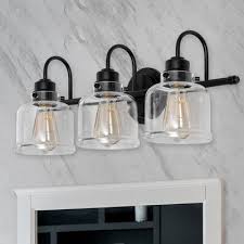 This typically ensures pleasant proportions to the overall size of your bathroom. Longshore Tides Erasmus 3 Light Dimmable Vanity Light In 2021 Vanity Lighting Black Bathroom Light Fixtures Farmhouse Light Fixtures