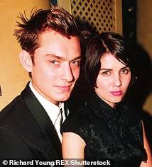 Jude Law, 51, is supported by his children Iris and Rafferty and wife  Phillipa, 38, as he is awarded a star