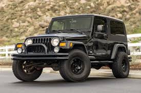 Image result for Brilliant Black 2004 Jeep