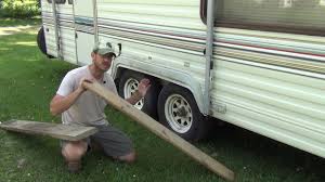 Then extend the rear stabilizing jacks just enough to prevent rocking. How To Level A Travel Trailer On A Permanent Site Rv Hometown
