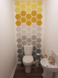 Mum Makes Stunning Feature Wall In Her Bathroom Using Masking Tape Trick And Old Paint Washi tape sun wall mural made with gold washi tape.