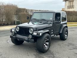 Image result for Brilliant Black 2003 Jeep