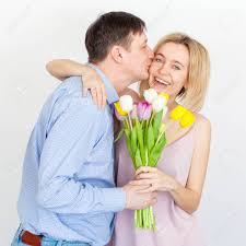 Our local florists use seasonal flowers to arrange the freshest bouquets, and your flowers for mom will be delivered right to her door. Man Gives A Bouquet Of Flowers To Woman Husband Gives A Gift To His Wife Mother S Day Valentines Day Stock Photo Picture And Royalty Free Image Image 101121380