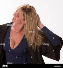 Smiling cleavage hi-res stock photography and images - Page 2 - Alamy