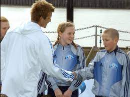 He is an english professional footballer who plays as a striker for premier league club tottenham hotspur and captains the england national team. England Star Harry Kane Posed With David Beckham And His Childhood Sweetheart When Aged 11 Seven Years Before They Began Dating