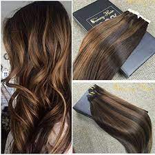 These radiant ribbons were created using color touch, featuring a smoky blend of 9/97 + 9/16 + 7/73. Sunny 14inch 20pcs 50g Two Tone Color 2 Fading To Dark Brown Mixed Honey Blonde Colorful Highlight Balayage Hair Inspiration Color Tape In Hair Extensions Hair