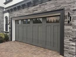 Gray Garage Door Clopay Canyon Ridge Collection Faux Wood Carriage House Garage Door Design 12 Wit Modern Garage Doors Garage Door Styles Garage Door Design
