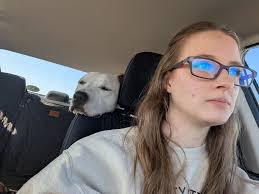 Ruben went with the family to 7Brew. Ruben got a pup cup. Ruben didn't get  a bandana. Ruben isn't a dog. 🦨 Ruben isn't complaining. Be more like  Ruben!💙