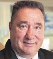 Adams: County planned to pave street