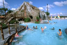 Disney Resort Hotels Disney S Polynesian Resort Guests In The Pool Walt Disney World Resort Polynesian Resort Disney Polynesian Resort Disney World Florida