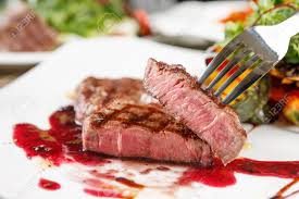 Looking to spice up steak night? Forking Up A Sliced Beef Sirloin Steak On White Plate Stock Photo Picture And Royalty Free Image Image 114666278