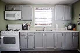 When it comes to kitchens, gray kitchen cabinets are the new white! Green Walls Grey Cabinets Novocom Top