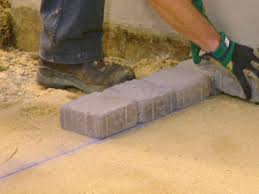 We totally transformed our backyard by laying some new pavers. How To Build A Paver Patio How Tos Diy