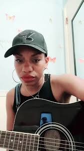 Elle King Sings to Son