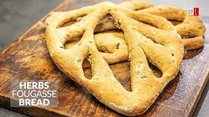 Some versions are sculpted or slashed into a pattern resembling an ear of wheat. Fougasse Bread Recipe With Herbs Food Channel L Youtube