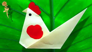 D'un pliage en papier pour enfant se crée un avion qui prend son envol. Origami Facile Coq Youtube