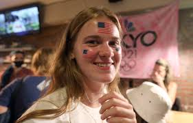 Fans cheer for Olympic rower Charlotte Buck in Nyack
