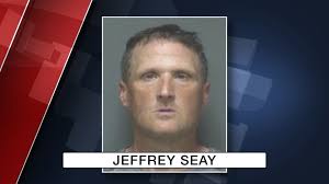 Man arrested after mom found locked in moving truck