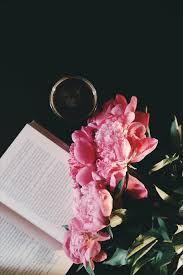 This coffee table book will teach you the history of the company that has changed fashion forever. Hd Wallpaper Pink Petaled Flowers Near Book Black Table Books Coffee Cup Of Coffee Wallpaper Flare