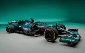 On the aston martin db11 steering wheel, square is the new round. Aston Martin Reveals First F1 Car For 61 Years