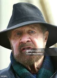 Jack Ames holds his "Stop Abortion Now" sign next to others holding... News  Photo