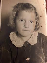 My mother passed away recently and this is a photo of a photo my sister  sent me. I love this photo. Can someone fix the tint and/or color, please.  Thank you for