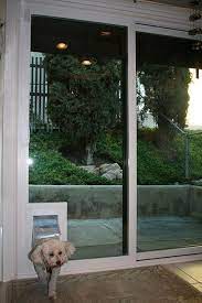 The petsafe sliding glass pet door is lined with weather stripping, and it has a magnetic flap closure. 15 Doggy Doors Ideas Dog Door Pet Door Pet Doors