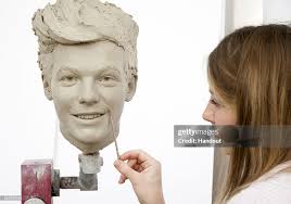 In this handout image provided by Madame Tussauds, sculptor Georgina...  News Photo
