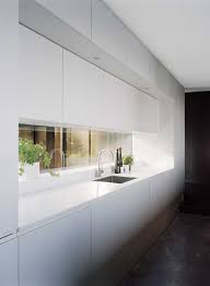 Back Wall Of Kitchen Reflective Surface Lacquered Cabinetry Above Kitchen Layout Modern Kitchen Minimalist Kitchen