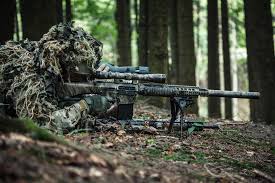 Netting can be laid over the stock in preparation for paint. How To Camouflage A Rifle Sniper Country