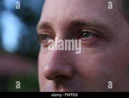 Personnel assigned to the Department of State Guard of Ukraine infiltrate a  building during an antiterrorism raid rehearsal as part of Rapid Trident  2019 at Combat Training Center-Yavoriv, Sept. 18, 2019 Stock