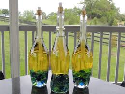 Clamp an empty wine bottle to a fence or wall near your outdoor deck or patio. 17 Thing You Can Do With Empty Wine Bottles