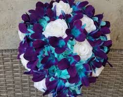 The blue orchid bouquets usually seem to undermine the full potential of the charming flower. Blue Orchid Bouquet Etsy