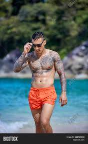 With tenor, maker of gif keyboard, add popular tattoo guy animated gifs to your conversations. Athletic Tattooed Guy Image Photo Free Trial Bigstock