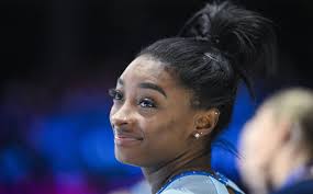 Simone Biles Embraces Golden Hour With Sparkly Bikini in New Vacation Pics