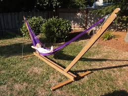 The hammock can be used for relaxing during the day and as a bed at night. Patio Hammock Stands Ideas On Foter