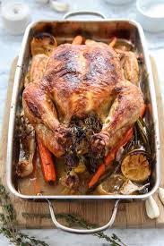 Then place chicken in a broiler pan. Juicy Roast Chicken Foodiecrush Com Chicken Recipes Dinner Whole Oven Ideas Baked Whole Chicken Recipes Whole Baked Chicken Chicken Recipes