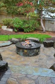 Create the first tier of the fire pit by forming a circle, alternating the large and mini bricks to create a pattern. 39 Backyard Fire Pit Ideas Design Trends Sebring Design Build