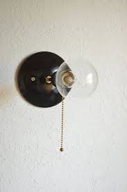 Pulley Black Brass Pull Chain Industrial Modern Wall Sconce Etsy Industrial Modern Wall Sconce Modern Wall Sconces Bathroom Wall Lights
