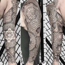 Geometric tattoo designs can be depicted through the use of simple, repeating lines, symmetry, or highly complex patterns that fully reflect the beauty and order found in nature. Geometric Tattoos Meanings Tattoo Designs Artists
