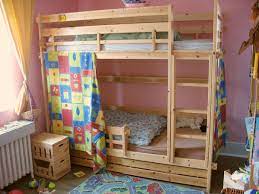 Double bunk bed with sofa underneath. Bunk Bed Wikipedia