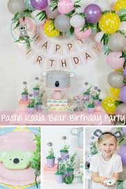 Diy First Birthday Decoration At Home We Love This Pastel Koala Bear Birthday Party With A Few Easy Diy Projects And Pastels Bear Birthday Party Flower Birthday Party First Birthday Party Themes