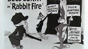 elmer grunon no tendra ya armas de fuego cazara a bugs bunny y del pato lucas con una guadana bugs bunny y del pato lucas