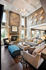 Nature decor for a large tall wall. Coral Stone Wall Design On Fireplace And Tv Mount High Ceilings And Large Windows High Ceiling Living Room Elegant Living Room Decor Tall Ceiling Living Room