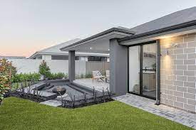 Browse from a wide range of home designs now! Grey Brick House Facade Novocom Top
