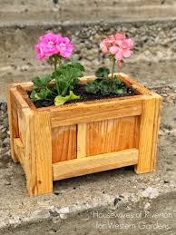 The trellis will help stabilize taller plants, or give climbing vines something to hold on to while it fills the back with flowers. Diy Porch Planter Box For Mother S Day Western Garden Centers