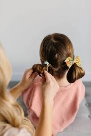 Having it braided or cut short are the first ideas that come to mind when you think of how to reduce to a minimum the troubles of black hair styling. 3 Easy Hairstyles For Kids Braids Buns And Wavy Hair The Effortless Chic